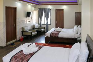 Voodi või voodid majutusasutuse Apartment Hotel 11 Thamel toas