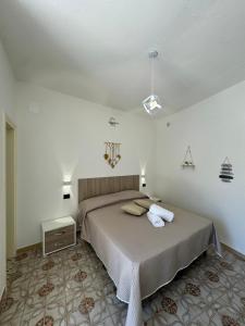 Postel nebo postele na pokoji v ubytování Villa Chiena Forio