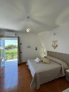 Postel nebo postele na pokoji v ubytování Villa Chiena Forio