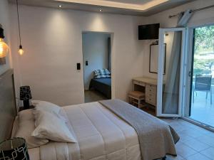 Postel nebo postele na pokoji v ubytování Olive house