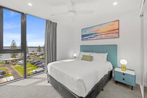 Ένα ή περισσότερα κρεβάτια σε δωμάτιο στο Marine Quarter Apartments by CLLIX