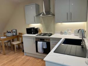 Η κουζίνα ή μικρή κουζίνα στο New Toasty Nook +9 φωτογραφίες