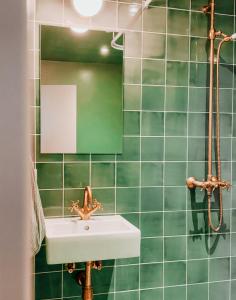 Et badeværelse på Grønbechs Hotel