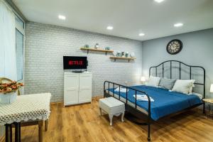 Ένα ή περισσότερα κρεβάτια σε δωμάτιο στο Cozy Studio in Varna City Center +31 φωτογραφίες