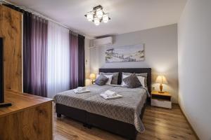 Ένα ή περισσότερα κρεβάτια σε δωμάτιο στο Luxury apartment with sea view,FREE parking!