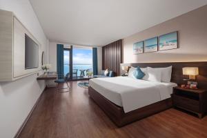 Canvas Danang Beach Hotel客房内的一张或多张床位