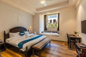 Clarks Resort The Archi`s Castle, Ajmer客房内的一张或多张床位