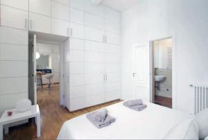 Voodi või voodid majutusasutuse Navona Secret Suite toas