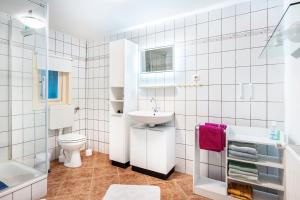 Ένα μπάνιο στο Ferienhaus Himmelreich +23 φωτογραφίες
