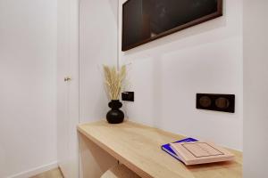 Televízia a/alebo spoločenská miestnosť v ubytovaní Charming apartment - 1BR-4P - AC - Marais