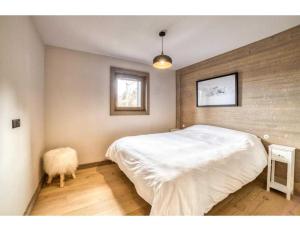 Posteľ alebo postele v izbe v ubytovaní Luxurious 4-room with pool, gym, spa and parking
