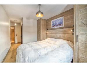 Posteľ alebo postele v izbe v ubytovaní Luxurious 4-room with pool, gym, spa and parking