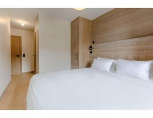Posteľ alebo postele v izbe v ubytovaní Luxurious 4-room with pool, gym, spa and parking