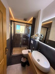 Koupelna v ubytování Villa Vidovic Apartments Bella Vista Mare + 11 fotografií