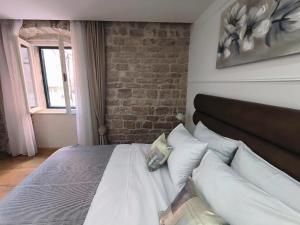 Posteľ alebo postele v izbe v ubytovaní Rialto Luxury Apartment