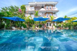 Der Swimmingpool an oder in der Nähe von Ancient Garden Boutique Hoi An