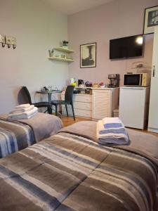 Kuchyň nebo kuchyňský kout v ubytování B&B Rubino + 16 fotografií