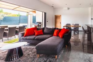 Et opholdsområde på Maison Sanchez - Maison Climatisée avec Piscine