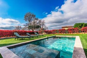 Swimmingpoolen hos eller tæt på Maison Sanchez - Maison Climatisée avec Piscine