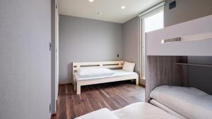 Katil atau katil-katil dalam bilik di Gate Resorts Kugenuma Kaigan