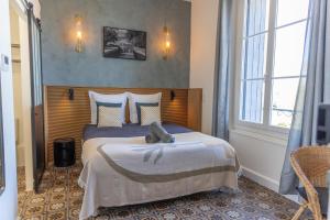 Postel nebo postele na pokoji v ubytování Casa-Belle