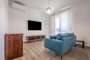TV a/nebo společenská místnost v ubytování Podere San Biagio