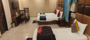 Postel nebo postele na pokoji v ubytování Hotel City Lite Delhi Airport