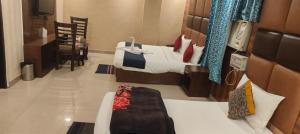 Postel nebo postele na pokoji v ubytování Hotel City Lite Delhi Airport