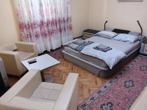 Postel nebo postele na pokoji v ubytování Vila Dina