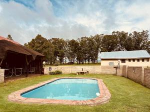 Bazén v ubytování Lourenza Wild en Plaas Lodge nebo v jeho okolí