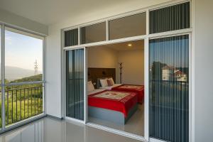 Postel nebo postele na pokoji v ubytování White City Villa