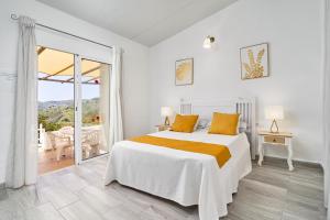 Posteľ alebo postele v izbe v ubytovaní Villa Piedra Blanca