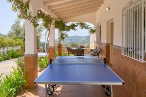 Stolný tenis v ubytovaní Villa Piedra Blanca alebo v jeho okolí