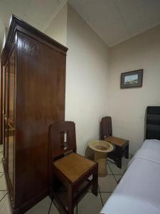 Letto o letti in una camera di RedDoorz Plus near Parahyangan University