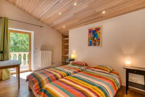 Ένα ή περισσότερα κρεβάτια σε δωμάτιο στο Maison Citron +26 φωτογραφίες