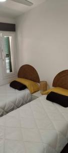 Postel nebo postele na pokoji v ubytování toni's apartament Menorca