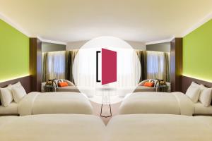 Ліжко або ліжка в номері Prince Hotel, Marco Polo