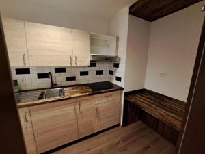 Kuchyň nebo kuchyňský kout v ubytování good bed Aarwangen