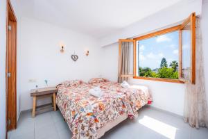 Ένα ή περισσότερα κρεβάτια σε δωμάτιο στο Apartamento Felipe 2-3