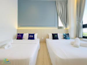 Letto o letti in una camera di Sunway Grid by RR JBcity