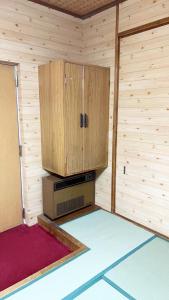 Postel nebo postele na pokoji v ubytování 日光いろは