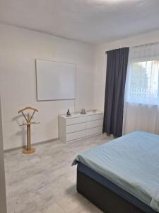 Ferienwohnung Anita客房内的一张或多张床位