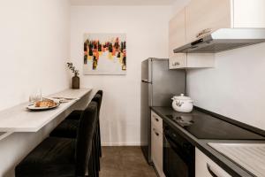 A cozinha ou cozinha compacta de The Howard Hotel