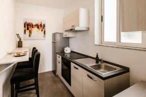 A cozinha ou cozinha compacta de The Howard Hotel