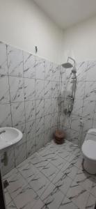 Koupelna v ubytování Homestay Sa'adah + 29 fotografií
