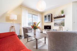 Posezení v ubytování Ferienwohnung Atlantic