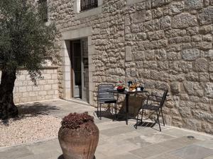 Patio nebo venkovní prostory v ubytování Bastide La Guilhabertie