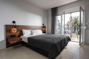 Katil atau katil-katil dalam bilik di Danae Comfort Living