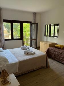 Postel nebo postele na pokoji v ubytování BM Flowers