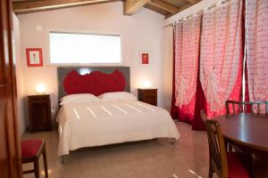 Postel nebo postele na pokoji v ubytování Casa VACANZE MADONNA DELLA SANITA' + 59 fotografií